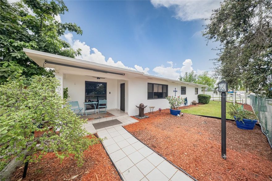 Welcome to this beautifully maintained 4-bedroom, 2-bath single-family home located in the desirable Amelia District neighborhood. Offering 2215 sq. ft. of comfortable living space, this spacious residence includes a versatile in-law quarter perfect for extended family or guests. Enjoy peace of mind with a newer roof installed just two years ago. With no HOA, you'll have the freedom to make this home your own, truly. Tile flooring throughout, generous closet space, and a covered terrace ideal for relaxing or entertaining. Situated close to top-rated schools, parks, shopping, dining, and major highways.