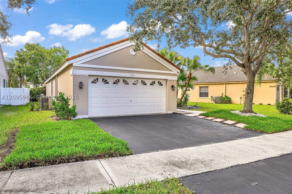 Photo of 815 Falling Water Rd, Weston, FL 33326 (MLS # A12095946)