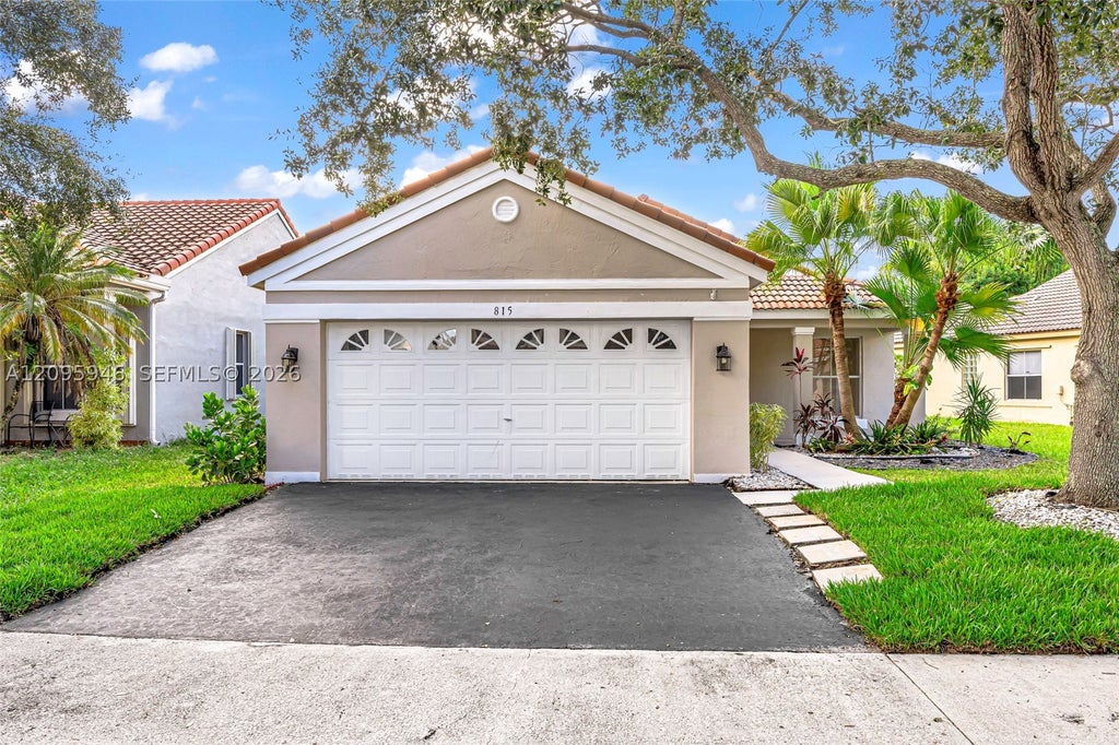Photo of 815 Falling Water Rd, Weston, FL 33326 (MLS # A12095946)