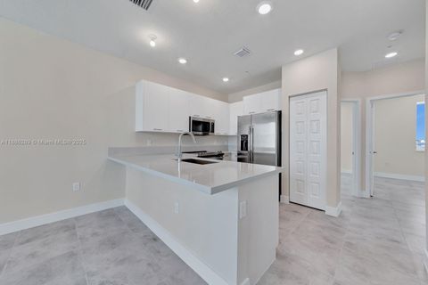 Photo of 6420 NW 102nd Path #303, Doral, FL 33178 (MLS # A11886289) Photo of 6420 NW 102nd Path #303, Doral, FL 33178 (MLS # A11886289)