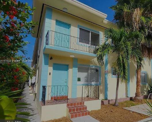 renovated impact window, stainless steel appliances, granite counter, open balcony