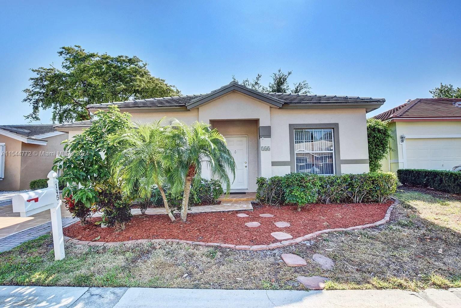 145 Caribe Ct Ct, Green Acres, Palm Beach County, Florida - 3 Bedrooms  
2 Bathrooms - 