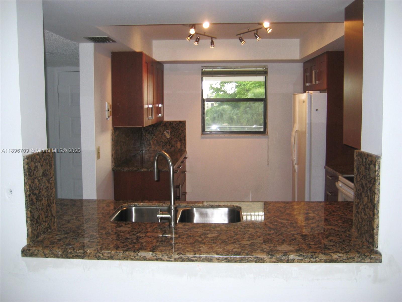 Enjoy a peaceful golf view from your screen balcony from this beautiful updated 2-bedroom, 2-bathroom condo. The kitchen features granite countertops and plenty of cabinet space. Also, you have a storage cage. As a resident, you'll have access to the Bonaventure club, offering a wide range of amenities including a fitness center, racquetball and tennis courts, basketball, swimming pool, skating, bowling alley, and daily activities for all ages.