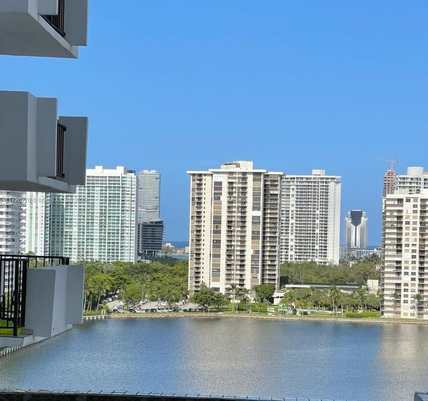 Prime location in Aventura! Discover a very spacious layout flooded with natural light and breathtaking water views. This updated unit features two exceptionally assigned parking spaces, brand-new soundproof and hurricane-proof windows; new PVC plumbing; and a 2-year-old A/C unit. The generously sized bedroom and living area offer plenty of closets for ample storage, including a walk-in closet and four extra closets, plus an assigned extra storage unit. In addition to 24-hour security and concierge services, the building offers great amenities, including two tennis courts, two swimming pools, a fully equipped gym, boating dock, and storage for paddleboards. Enjoy walking to grocery stores, restaurants, and shops, including Aventura Mall, and a 10-minute drive to the beach.