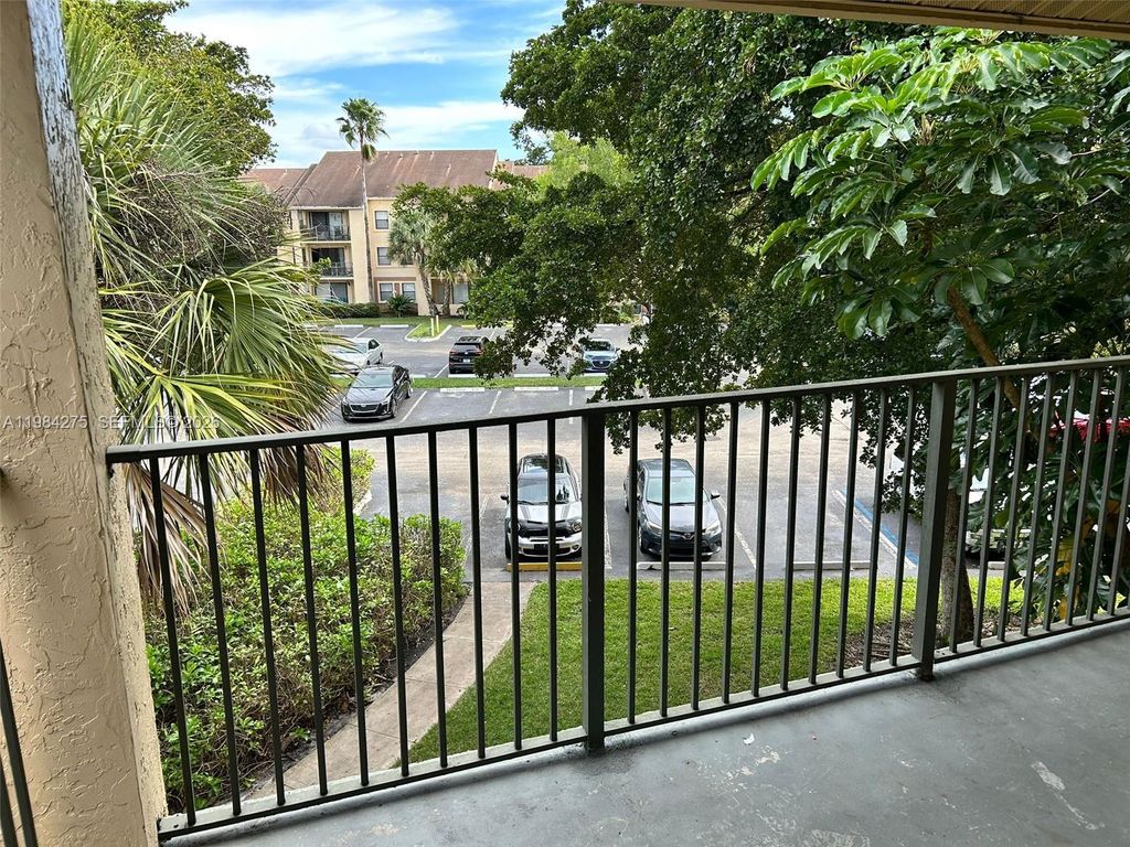 Photo of 9999 Summerbreeze Dr #118, Sunrise, FL 33322 (MLS # A11984275)