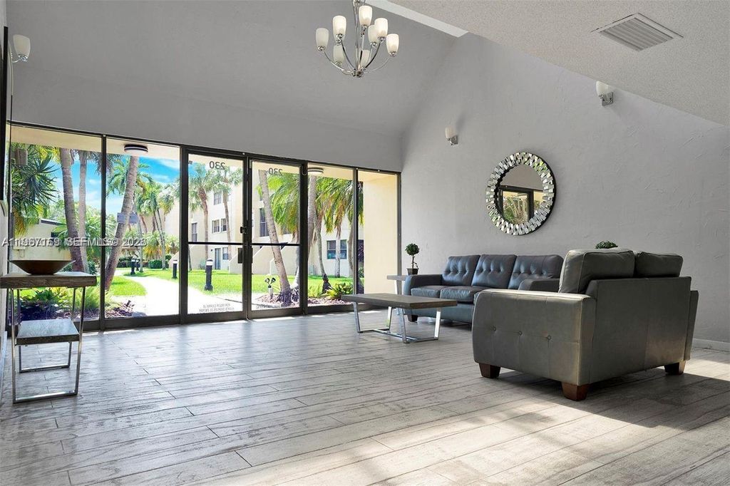 Photo of 230 Lakeview Dr #107, Weston, FL 33326 (MLS # A11967169)