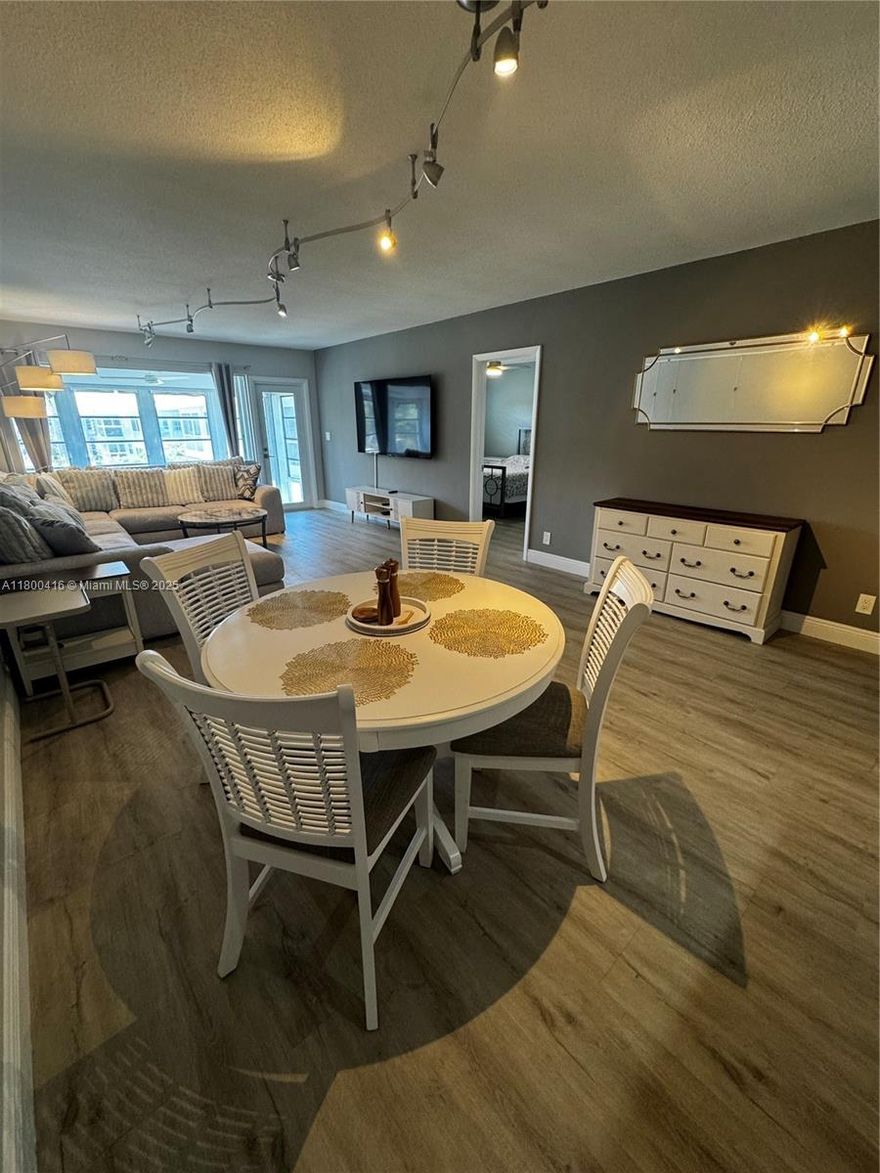 Welcome to the Gated Community Rio Nuevo in Fort Lauderdale! This large 1bedroom-1.5bath condo is situated in prime location in the East side of town. This complex sits on one of the widest ocean access canals with no fixed bridges(community dock and dock rentals available). 5 minutes to Las Olas Blvd. New Roof. Impact Windows. No special assessments. Building Passed 50 year recertification. This unit has been furnished by an interior decorator and is equipped with 2 large walk in closets and being sold with all new silverware, dishes, and household items recently purchased. 1 covered parking space and plenty of guest parking at all tines. New electrical panel and newer AC. Storage unit too. Building is very quiet. Pool gets sunshine all day and has BBQ.  Enjoy your life! Come tour today.