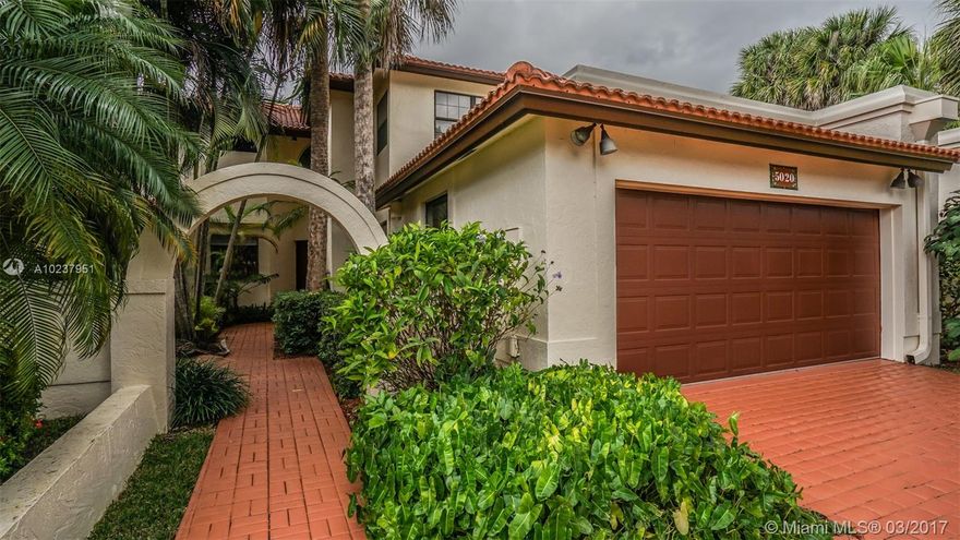 Rarely available townhouse unit within Doral Estates.  Just 3 homes away from the Pool and Tennis Courts.  Enjoy Doral's most elegant community, with peace and quiet and convenience to all Doral has to offer.  Property backs to Trump resort.