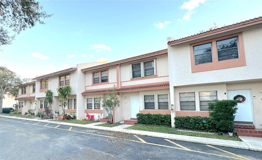 Photo of 9120 NW 40th St #18, Coral Springs, FL 33065 (MLS # A12005627)