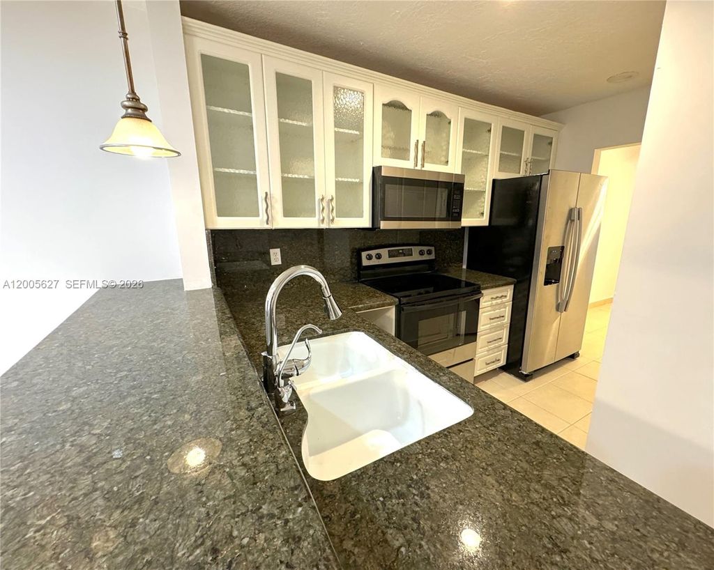 Photo of 9120 NW 40th St #18, Coral Springs, FL 33065 (MLS # A12005627)