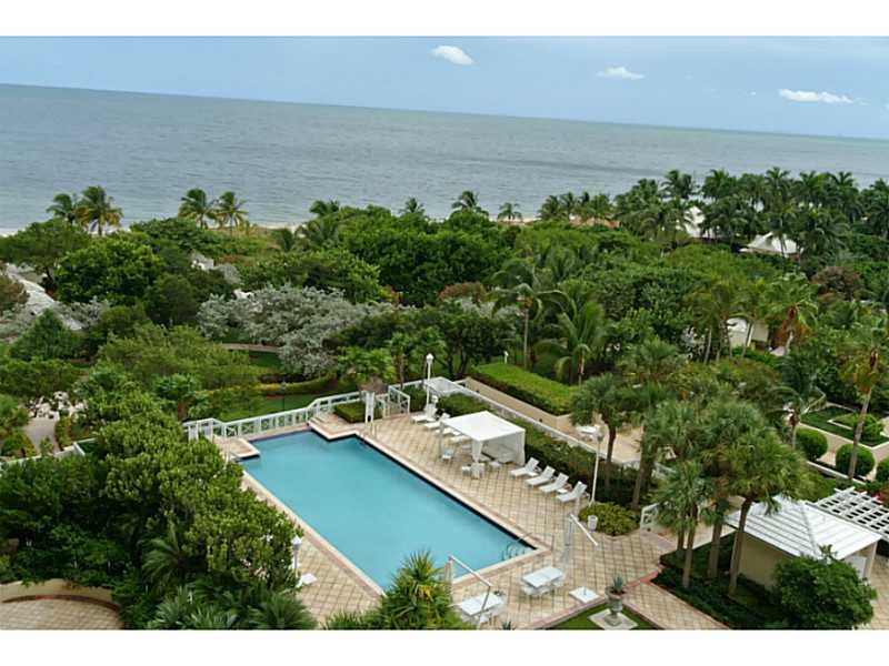 Best unit in complex, exquisitely decorated, marble floors, carpets in bedrooms, unobstructed view of beach and bay. Master suite has a custom made $60,000 walk-in closet and a set up for a home theater with a drop down screen and surround system througho ut the unit. Brand New Poggenpohl kitchen cabinets and top of the line appliances and fixtures. Electric Hunter Douglas shades with remote control in living room, family room and master suite.