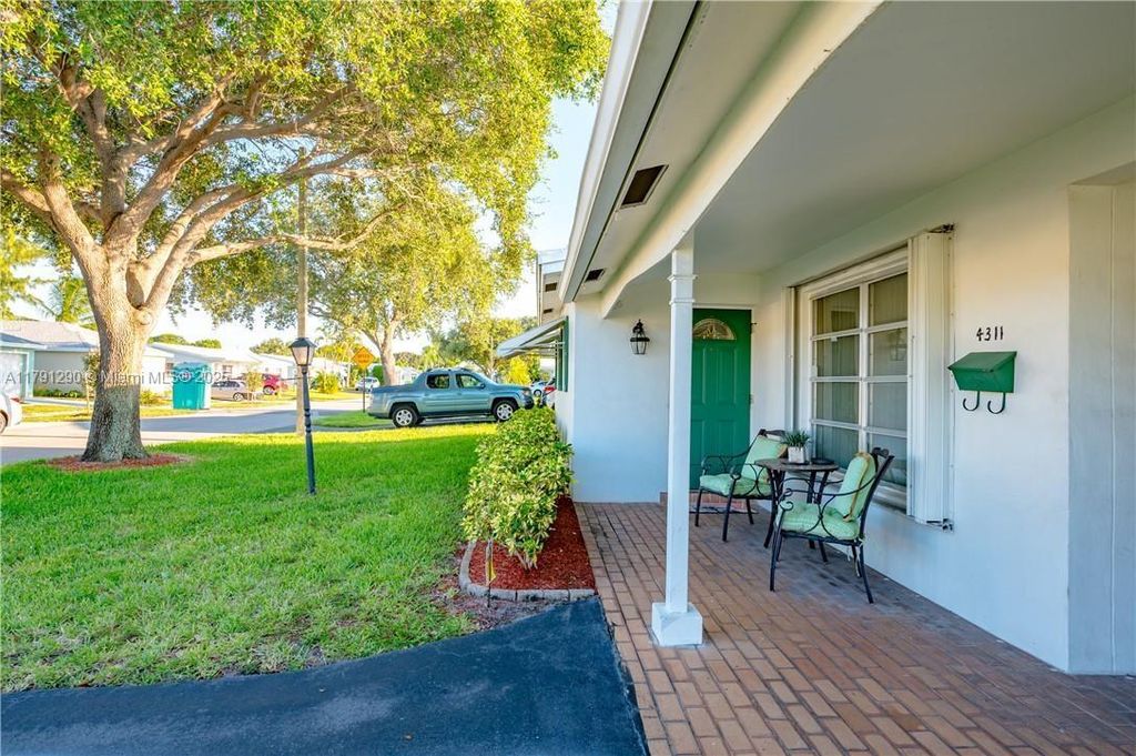 Photo of 4311 NW 1st Ter #47, Deerfield Beach, FL 33064 (MLS # A11791290)