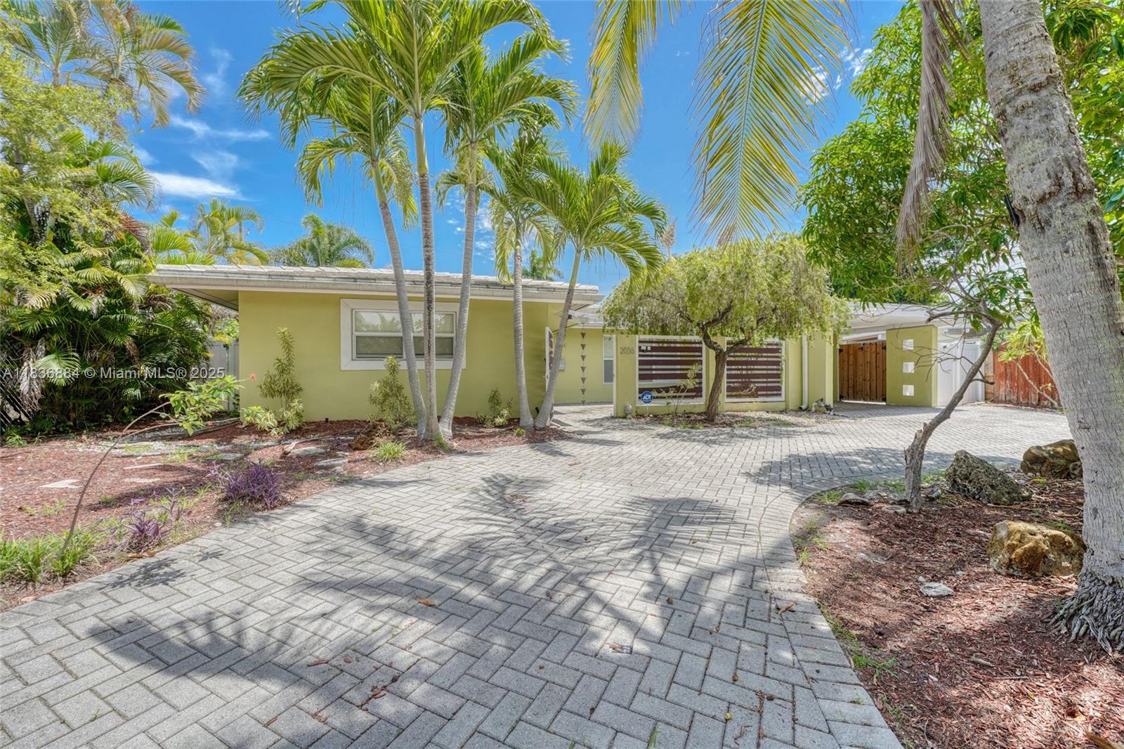 Unfurnished, Ready to rent TODAY & FAST approval! A mile to the BEACH! Private 3bdr/2 ba home in the very desirable & quaint community of Coral Shores! Contemporary kitchen, espresso color cabinetry, quartz counters, Stainless Steel appliances, large wall buffet to add lots of storage! Open concept dining room with lots of light & pretty views of the lush landscaping. Plank tile flooring throughout. Recently painted rooms and updated bathrooms. Impact windows & doors. Separate laundry room. Covered carport with large circular driveway with plenty of parking space! Mango & star fruit trees, well maintained landscaping, Fenced in, PRIVATE yard, and New turf. Amazing location, MINUTES from the BEACH!! Across from Target, famous restaurants, &Airport. Pet friendly