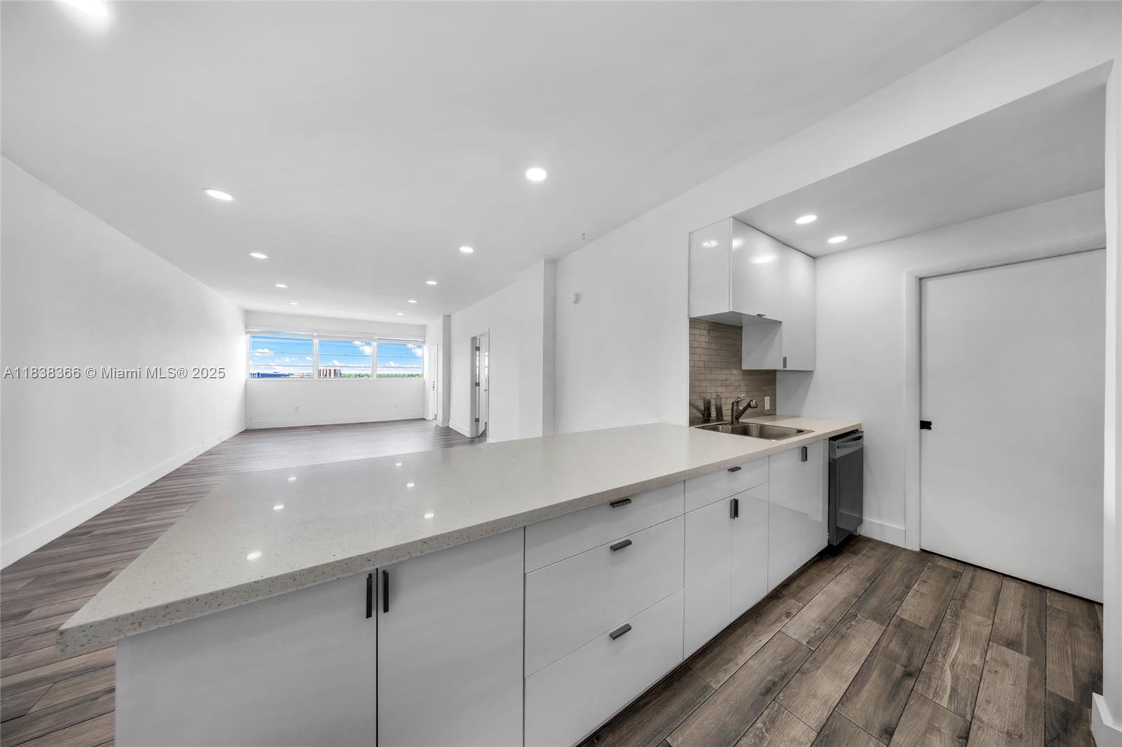 Remodeled PH corner unit with breathtaking water and skyline views from a massive wraparound balcony. Spacious 2BR, 2BA with open kitchen, tiled floors, great natural light, a well designed floor plan and generous closet space. Includes an additional room perfect for a home office, guest space or pantry. Watch incredible sunsets and launch your kayak or paddleboard from the canal. Located on the water in Keystone Harbor Club, a gated building with a waterfront pool. Ideal for investors or anyone seeking their own slice of Miami paradise. No rental restrictions. Assigned parking. Building is well managed and undergoing 60 year recert. Steps from Keystone Islands, minutes to Biscayne Blvd, Whole Foods, FIU, beaches, Bal Harbour and Aventura. Cash buyers preferred. Call listing agent to tour!