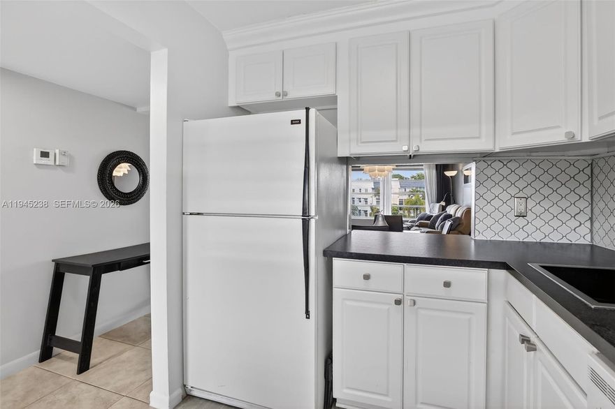 Beautiful condo with 1 bedroom and 1 bathroom in desirable Oriole Golf! Enjoy serene pool views from this bright third-floor unit with no neighbors above for added privacy and quiet. The Florida room or balcony is thoughtfully set up as a guest bedroom, offering flexible living space perfect for hosting visitors. Tile flooring runs throughout, and the home is being sold fully furnished and turnkey, ready for immediate enjoyment. The updated kitchen features white cabinetry and an attractive backsplash, creating a clean, inviting space. Tastefully decorated with attention to detail, this unit truly shows pride of ownership. Located in a HOPA-verified community, residents enjoy amenities including a pool, shuffleboard, outdoor grilling areas, and a gym. Cable and internet are included in the monthly fees.
AC (2015) and hot water heater (2022). An excellent opportunity for a full-time residence or seasonal retreat—this one is a must-see!