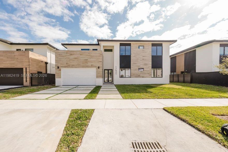 I am pleased to present a stunning 2025 two-story new construction home, which is now fully completed and ready for immediate occupancy with the Certificate of Occupancy in hand. This modern residence is designed with both luxury and durability in mind, featuring 5 spacious bedrooms and 4.5 beautifully designed bathrooms. The interior boasts an open-concept layout defined by high ceilings, elegant flooring, and a striking floating staircase. For added structural integrity, the home includes a solid concrete second-floor slab. Additional highlights include a finished garage with premium flooring—perfect for a home gym or flexible use—and a private backyard oasis featuring a gorgeous pool and jacuzzi. Contact Listing agent for all appointments.