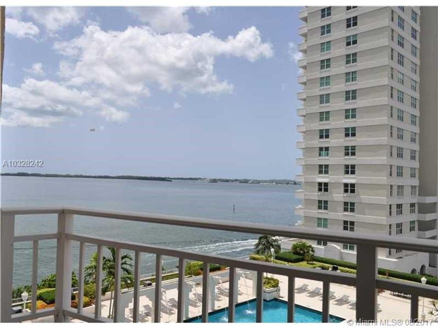Fabulous Water views! Spacious and contemporary unit with granite counter tops, wood cabinets, SS appliances and washer dryer in unit with plenty of closets. Relax from the balcony and watch the ships sail away!  . Enjoy the unique private island setting of  Brickell Key. Amenities: business center, outstanding gym with water views,  resort like pool areas,tennis and concierge.  Walk to Downtown, Mary Brickell Village shops, Mandarin Hotel, Brickell City Centre.