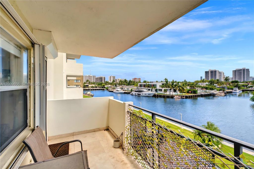 Photo of 401 Golden Isles Dr #307, Hallandale Beach, FL 33009 (MLS # A12009656)
