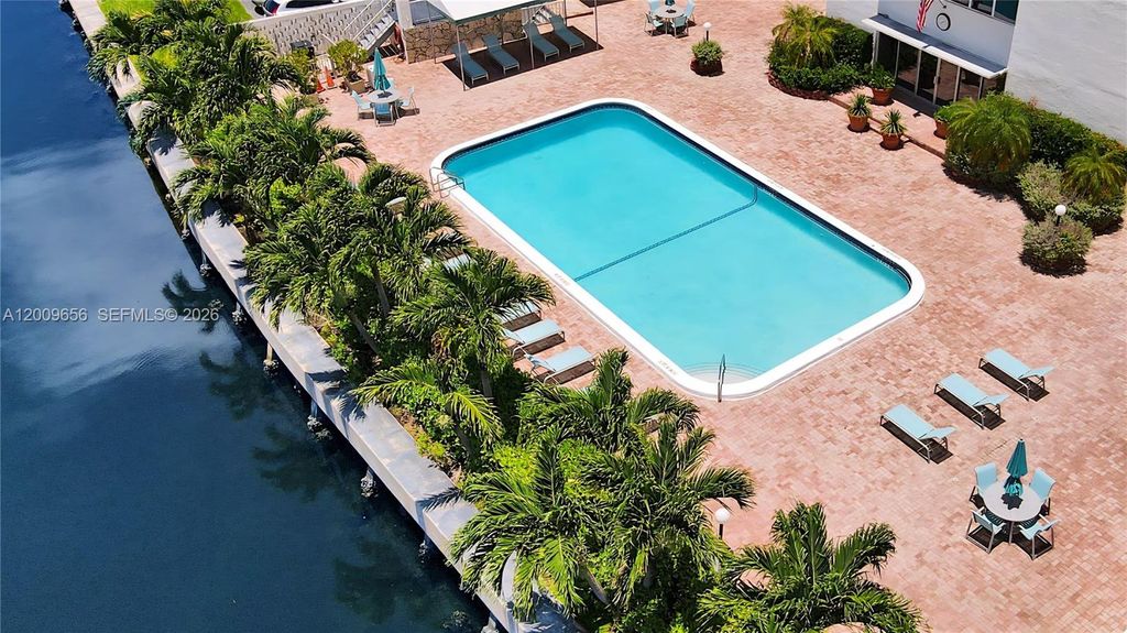 Photo of 401 Golden Isles Dr #307, Hallandale Beach, FL 33009 (MLS # A12009656)
