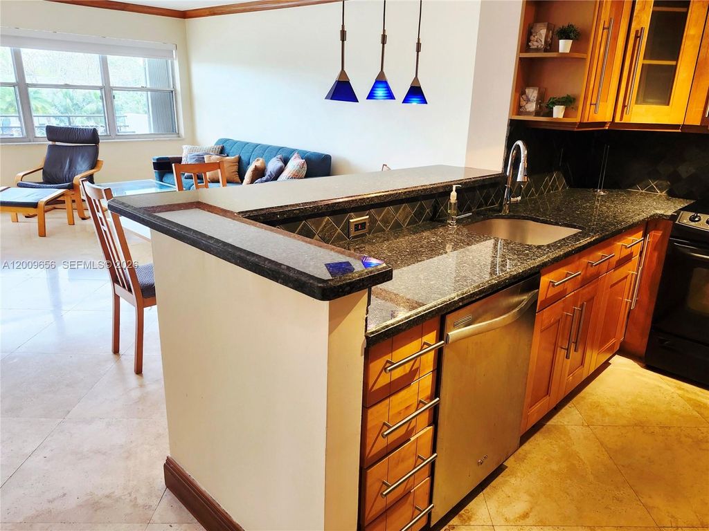 Photo of 401 Golden Isles Dr #307, Hallandale Beach, FL 33009 (MLS # A12009656)