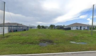 Ready to build on 2 adjacent lots close to Anchor Lake in fast growing Cape Coral. The 2 combined lot dimensions are 80x125 for a total of 10,019 sq ft. New Homes in the area range between 300K and 500K. Driving distance is 15 minutes to Ft. Myers beach or a longer ride of 30 minutes to the famous Sanibel Island Resorts and beaches. This great for the owner to build their dream home. Zoning : RD-D residential and Site plan has been filed.
