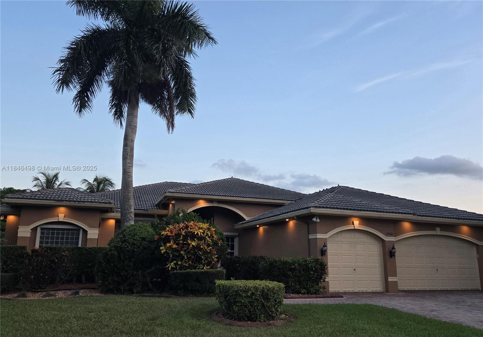 Riverstone Community is one of the most luxurious waterfront communities in Davie. This Mediterranean style home has a lake view backyard with tropical landscaping. 24 hour guard at gate. Riverstone features a recreational pavilion. Tennis and picket ball courts, full basketball court, and several walking paths. This beautiful home with split floor plan has a gourmet kitchen. Formal dining room. Large Florida room. Spacious office/bedroom. Master bedroom with large bathroom and his and hers closets. Laundry room. Three car garage. Easy to view and fast HOA approval. Available to move in.