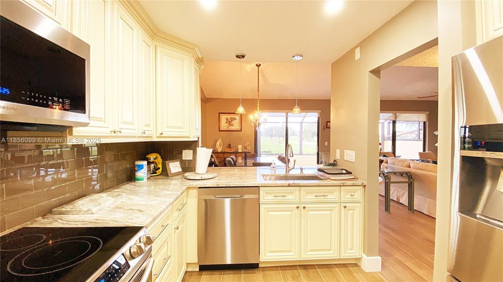 Photo of 437 Prestwick Ln, Palm Beach Gardens, FL 33418 (MLS # A11856099)