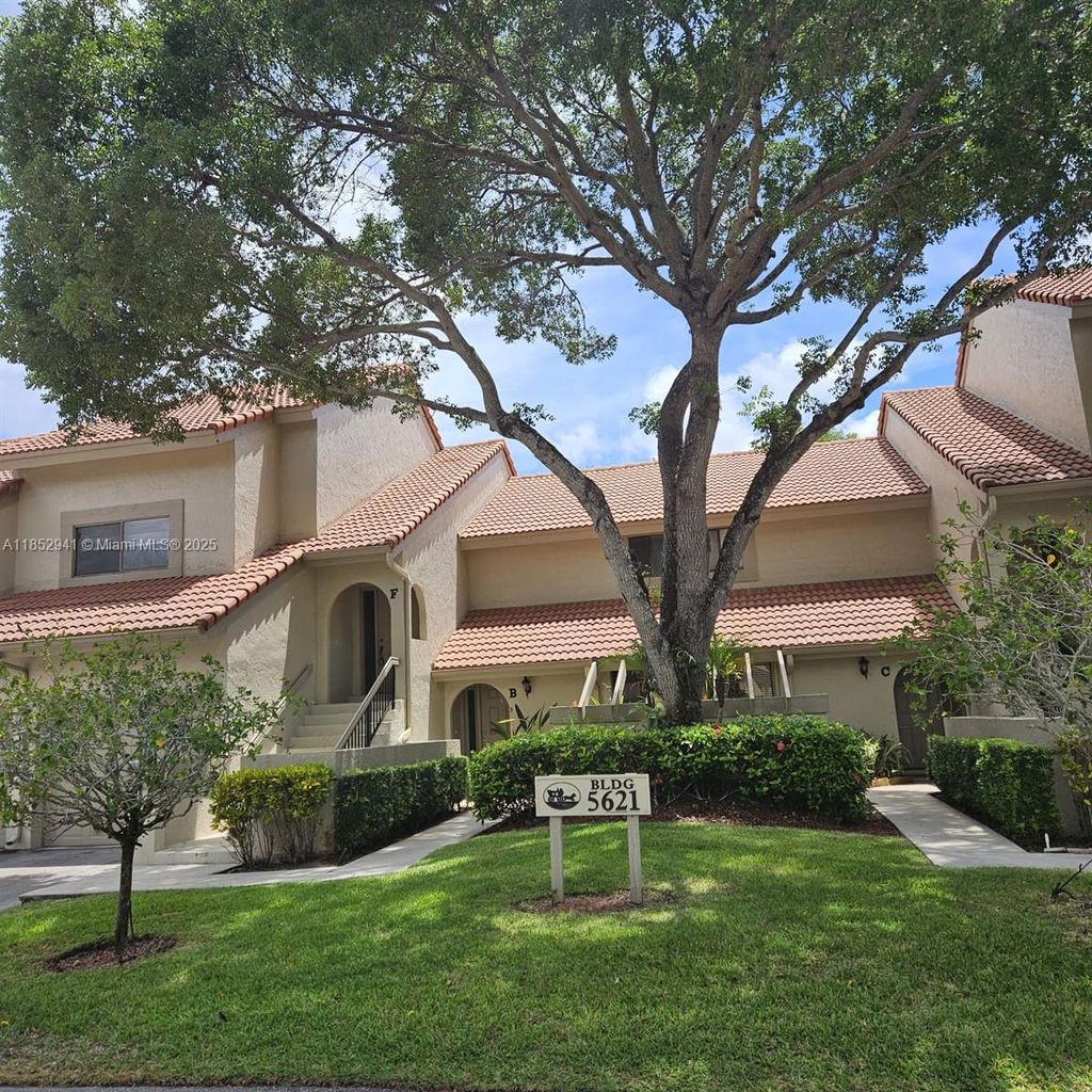 Photo of 5621 Coach House Cir #F, Boca Raton, FL 33486 (MLS # A11852941)