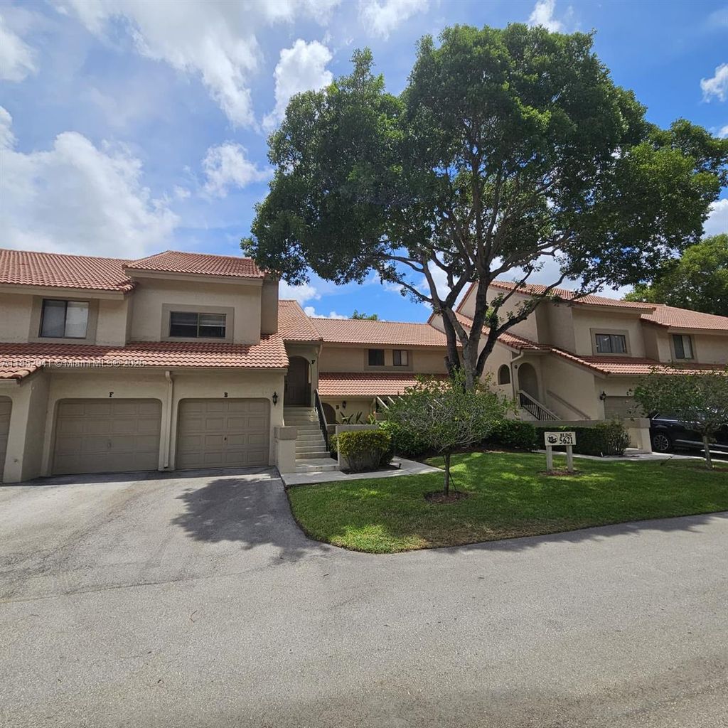 Photo of 5621 Coach House Cir #F, Boca Raton, FL 33486 (MLS # A11852941)