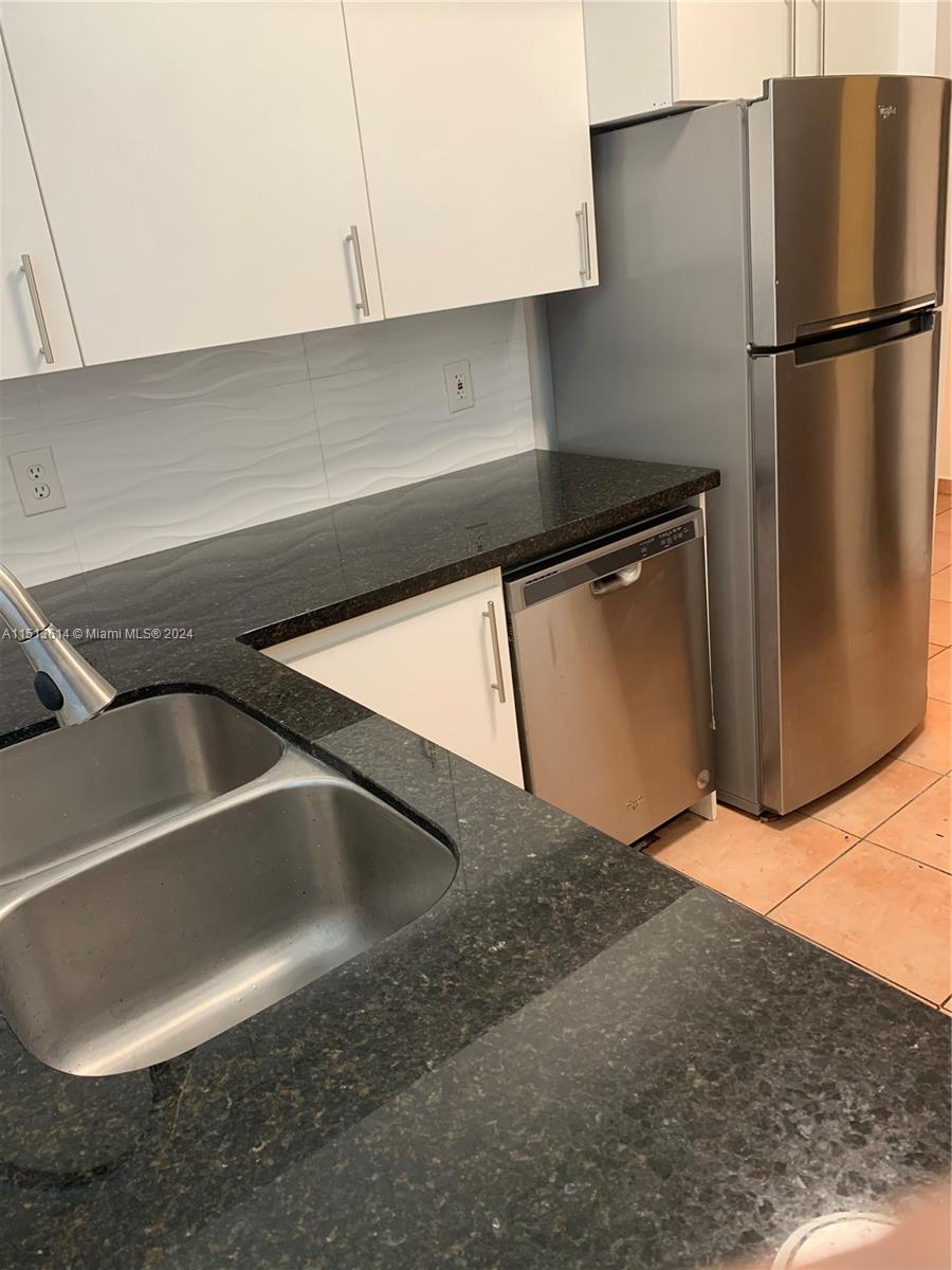 TIFFANY LAKES CONDO - Residential Lease