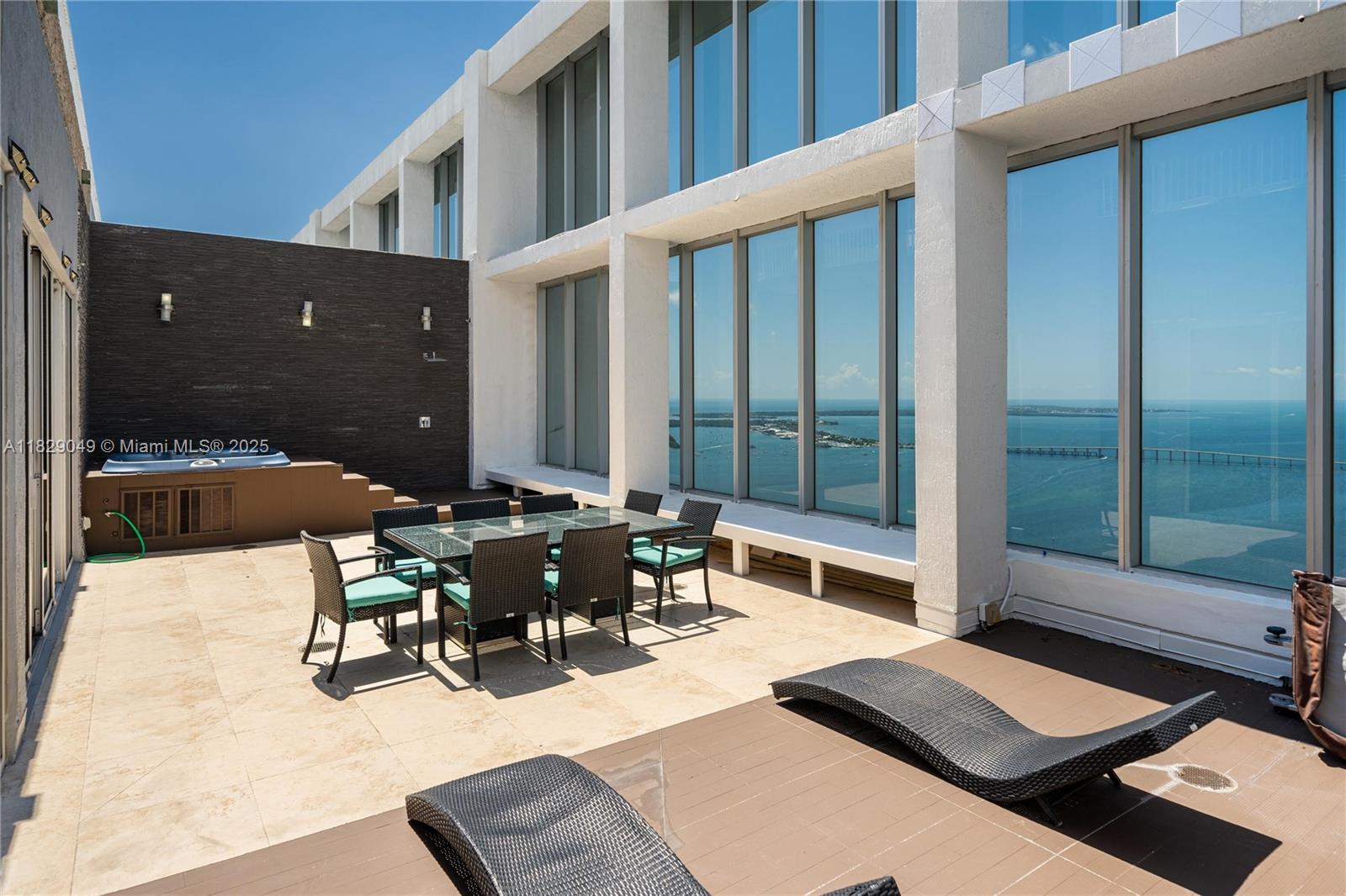 Welcome to the epitome of luxury living at Icon Brickell! Rarely Available 2 STORY Penthouse. Includes breathtaking ocean, bay, and city views in the Brickell Icon Building. The second floor is an open layout bedroom where you can walk right into your own unique and PRIVATE TERRACE with a hot tub and an outdoor shower overlooking the ocean. First floor includes two bedrooms with high impact sliding doors to balcony. Marble floors, private bar area with wine cooler and open kitchen for a entertaining.