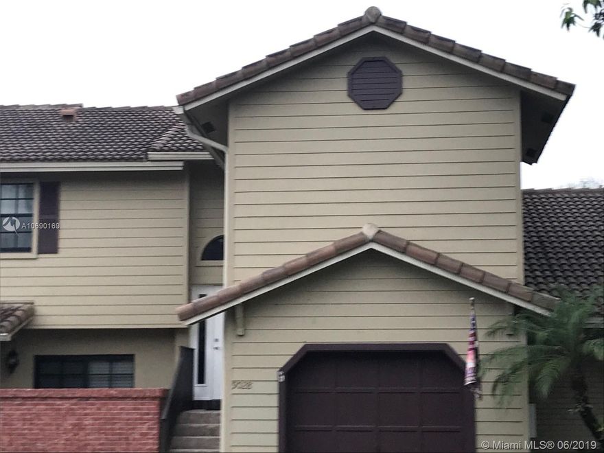 JUST REDUCED.... PRIME LAKEFRONT! PRICED TO SELL!  SPACIOUS 1,315 SQUARE FEEI - 2 BEDROOM/2.5 BATHS.  2 STORY TOWN HOME WITH ONE CAR GARAGE.  BRAND NEW $3000 HURRICANE FRONT DOOR. LIVING ROOM AND DINING ROOM OVERLOOKING LAKE WITH SLIDING GLASS DOORS LEADING TO COVERED PATIO.  CLOSE TO SHOPPING, RESTAURANTS, BANKS, SAWGRASS MALL AND WESTSIDE REGIONAL HOSPITAL.  GREAT LOCATION TWENTY MINUTES FROM FT LAUDERDALE AIRPORT. MINUTES FROM 595 TO DADE, BROWARD AND PALM BEACH COUNTY. COMMUNITY POOL,  PICNIC AREA AND DOCK.