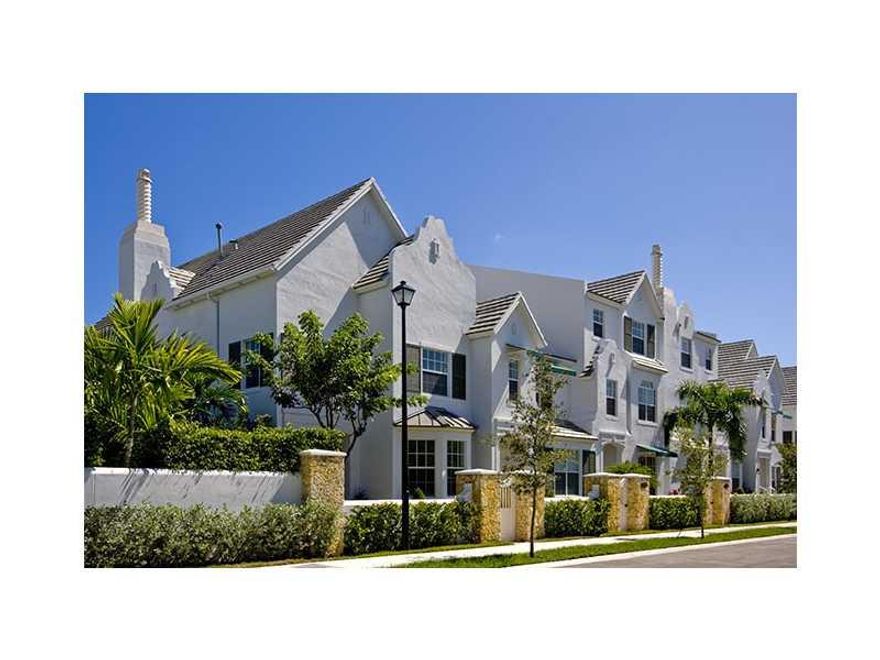 Spacious townhome located in the gated community of Pine Manor. Most desirable 2-story Aruba Model, 3/2.5 with patio off kitchen and 2nd level large open terrace for entertaining. Home features: tile floors in social areas, gas range, granite counters in  the kitchen and baths, hurricane impact windows/doors, window treatments, two-car carports with storage. Walk to everything South Miami has to offer