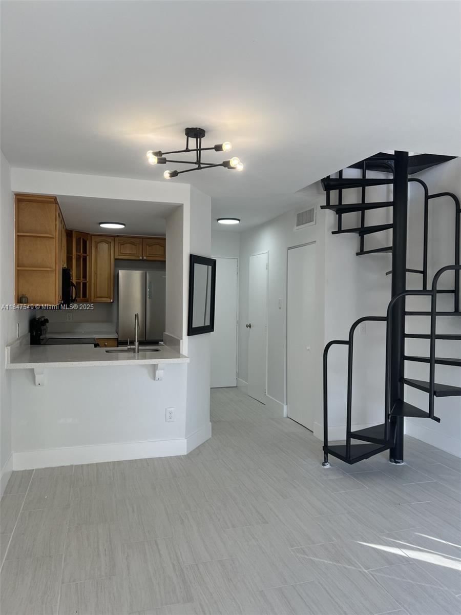 IMPECCABLE AND SPACIOUS!!!. Unfurnished 2 story townhouse style unit in desired Little River District, 1
bedroom, 1 bath and guest bathroom on first floor, updated kitchen with stainless steel appliances. Gated
community, large pool, assigned parking space, and a kayak/paddle board launch. GREAT LOCATION just minutes
away from MIMO, Wynwood, and the Design District, less than 15 minutes away from the Beaches, and Miami
International Airport, nearby great shopping centers, hospitals, schools and more. Unit Vacant. WATER AND TRASH
INCLUDED IN THE RENT.