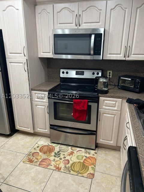 Tiny photo for 201 Lake Pointe Dr #203, Oakland Park, FL 33309 (MLS # A12033521)