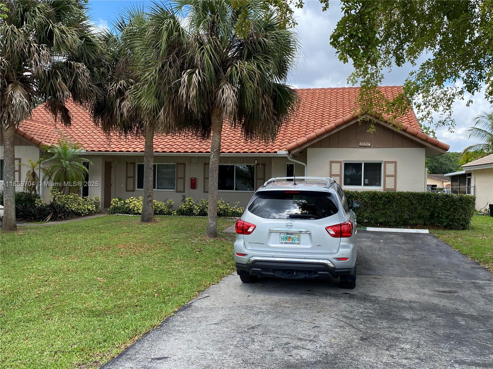 This is a spacious three bedrooms, two bathrooms duplex with living room, dining room, laundry room and a covered terrace with screen enclosure. The unit is just painted and was recently updated. It has ceramic tile on the floors, kitchen has wood cabinets, granite countertops, and stainless steel appliances. Four vehicles can be parked in the big driveway. The rental of this unit does not requires association approval. Please call listing agent for showing instructions.