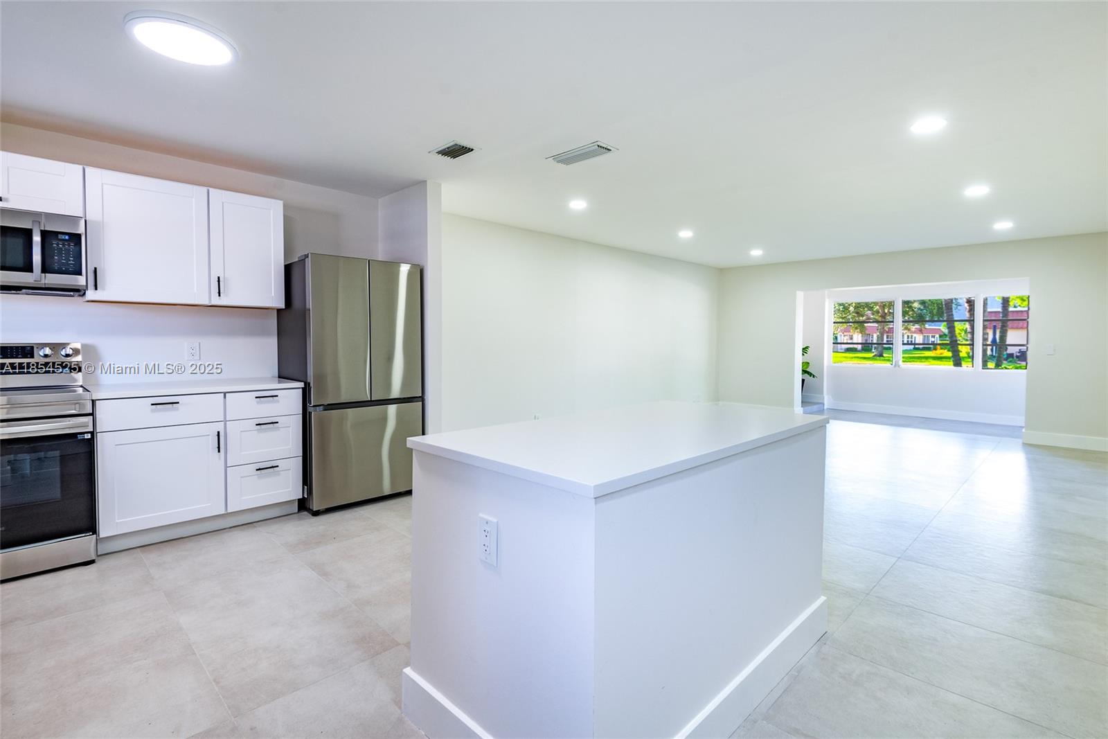 BRIGHT & UPDATED 1BR/1BA VILLACONDO in the desirable 55+ Covered Bridge community! This charming home offers an inviting open layout with abundant natural light, a modern kitchen with white cabinetry, quartz countertops, and stainless steel appliances. The spacious living area flows into an enclosed Florida Room, perfect for relaxing or enjoying the landscaped views. The bedroom features closet space, and the bathroom has been tastefully updated with contemporary finishes. Residents enjoy resort-style amenities including 2 heated pools, tennis, shuffleboard, walking trails, a clubhouse, and more. Conveniently close to shopping, dining, and major highways—this move-in ready gem is waiting for you!