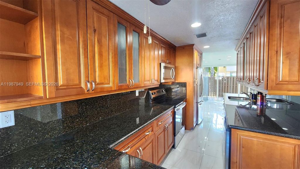 Photo of 841 NW 81st Ave #8, Plantation, FL 33324 (MLS # A11987949)