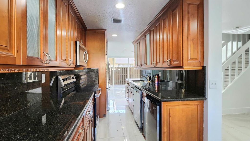 Photo of 841 NW 81st Ave #8, Plantation, FL 33324 (MLS # A11987949)