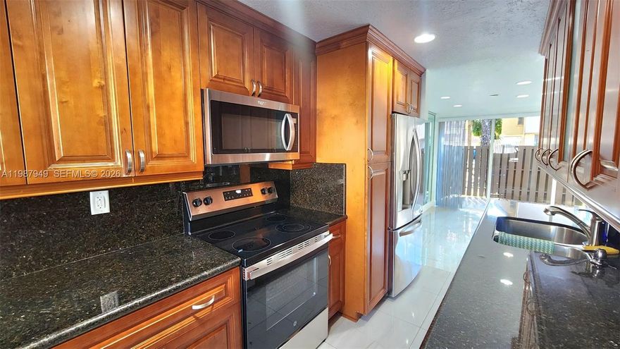 Experience comfort and style in this completely remodeled townhouse featuring 4 bedrooms plus an additional bedroom created from the converted garage, along with 3 full bathrooms. The exterior has been fully updated with impact windows that fill the home with natural light. Enjoy a spacious layout with tile flooring downstairs and vinyl flooring upstairs.

The master bedroom opens directly to a generous balcony, perfect for morning coffee while the private patio is ideal for BBQ evenings. The unit includes a washer and dryer. Conveniently located near major highways (Turnpike, I-95, 595). Just minutes from Broward Mall, Publix, Plantation Library, and 12 minutes from Sawgrass Mills.

Located in the desirable Jacaranda community, residents can enjoy two pools, a tennis court, a clubhouse, and a playground. HOA requires a minimum 650 credit score.