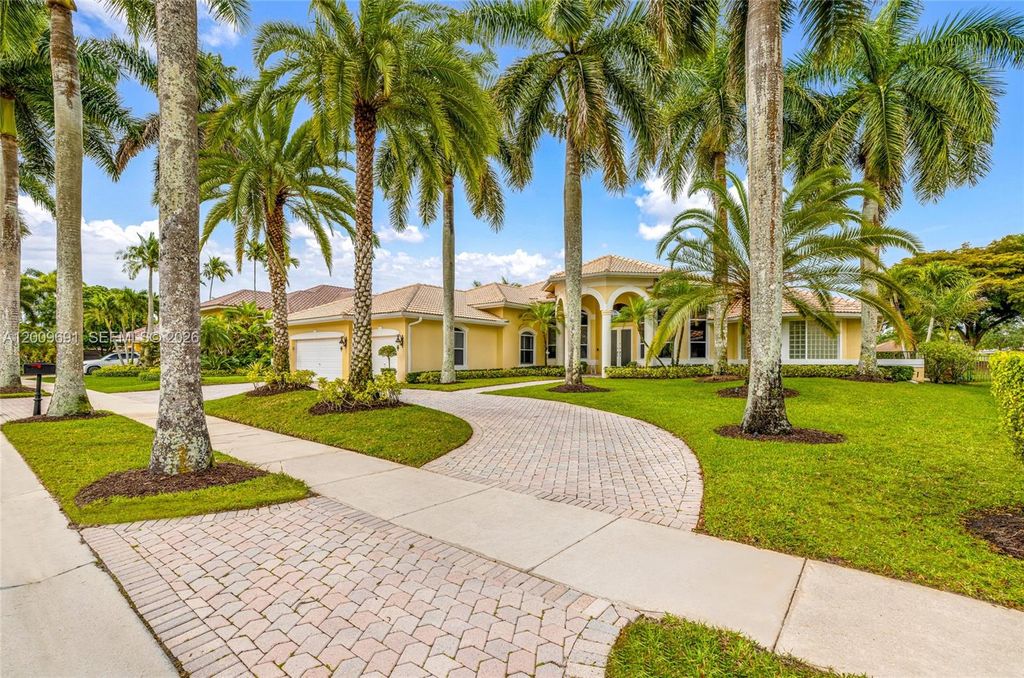 Photo of 2477 Poinciana Dr, Weston, FL 33327 (MLS # A12009691)