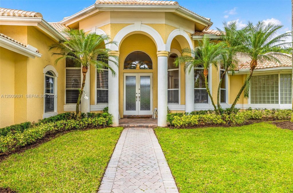 Photo of 2477 Poinciana Dr, Weston, FL 33327 (MLS # A12009691)