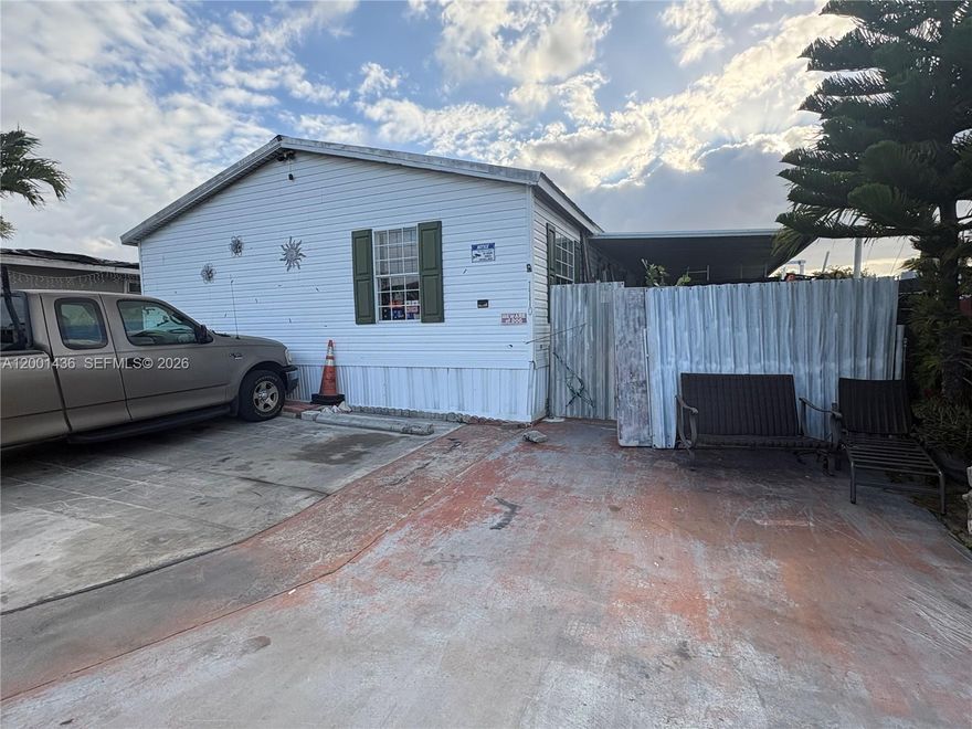 Income producing manufactured home. 5 Bed / 3 Bath spacious double-wide home with a canal view! Driveway parking and covered parking. Centrally located minutes away from Florida International University, Miami Intl Airport, and shopping centers. Land is not included.
