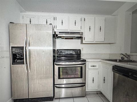 496 NW 165th St Rd D-614 Miami FL 33169