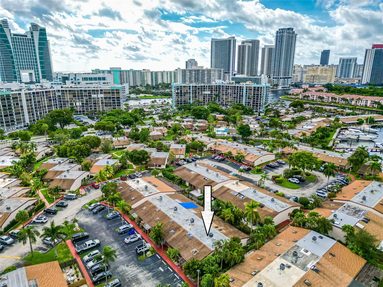 Experience the charm of this unique and spacious 2 bedroom, 2 bathroom corner villa in the coveted Harbourwood community of Three Islands in Hallandale. This charming villa offers an open-concept living space with vaulted wood-beamed ceilings and laminate flooring throughout. The remodeled bathrooms add a touch of elegance, with the master bathroom offering a double shower for added relaxation. The kitchen is equipped with stainless steel appliances, including a wine cooler. Brand new roof installed in 2024.
In addition to two assigned parking spaces directly in front of the unit, the community offers a variety of amenities, such as tennis and squash courts, a pool, and the option for dock rentals, providing easy water access for boating enthusiasts.
