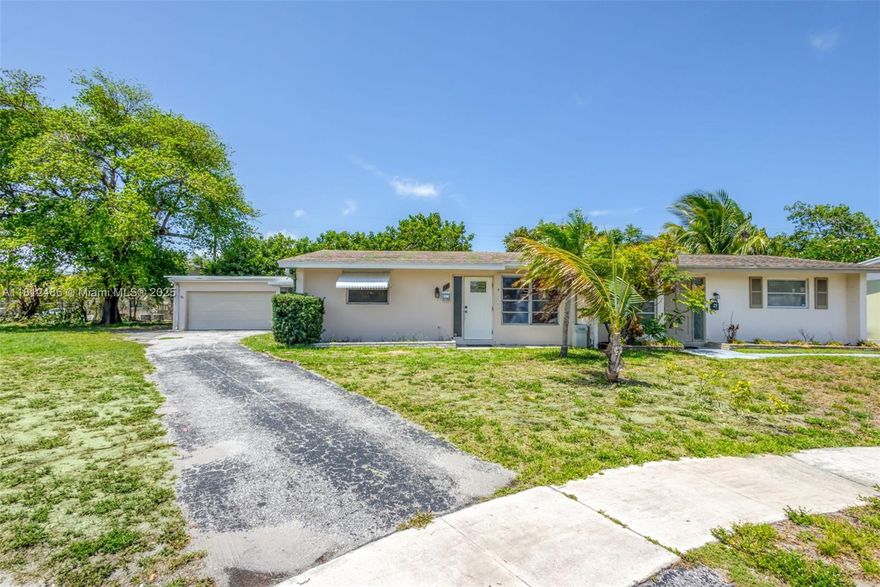 Welcome to the best home on the block! In this NO HOA home you get the size of two parcels for the price of one! Whether it be privacy and stability your looking for with a Concrete Block Construction Home or a Huge Detached Garage to to enjoy or convert as you and your family decide. You'll never find a home like this off prosperity farms with this much space. This home has been cleaned and repainted since last occupancy and has one updated bathroom and a fully updated kitchen.This home also comes with a fully standard size laundry room that can be doubled as a utility room at your desire. With the patio fully covered and screened in you never have to worry about getting rained on again! Enjoy all the benefits of this home & also check out the beach and mall both only 10 minutes away!!