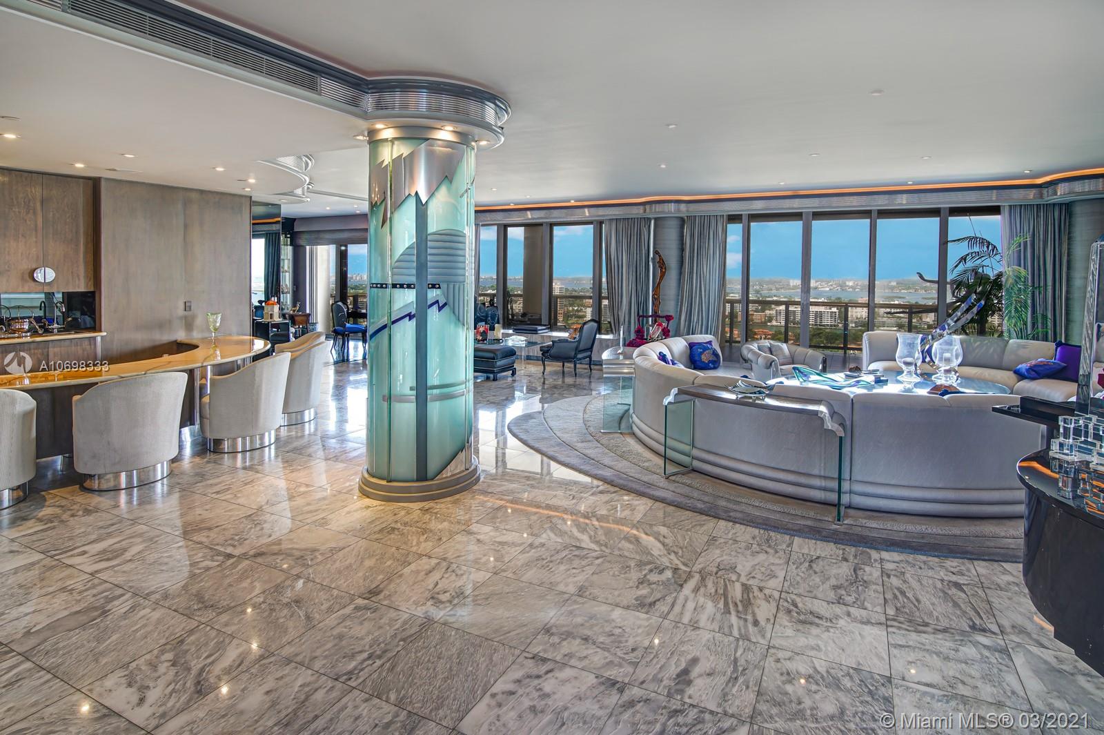 Private elevator leads you to one of the most unique Penthouses in Bal Harbour. Stretching over 5,883 living sq ft & 7,310 total sq ft/ per appraiser, this sky residence is larger than other penthouses & features endless Biscayne Bay, Ocean & city skyline views. Expansive wraparound terraces invite you to marvel at magnetic sunrises & sunsets. Grand foyer opens into a one of a kind spectacular living room w/ the bar & dining room created for entertaining large parties. It is followed by 2 guest bedrooms, 1 bedroom staff quarter, 5.5 baths, & a Royal size master suite w/ sitting area, his & her's baths & closets. Her closet galore features built- ins which will satisfy every fashionista. Bal Harbour Tower is a full service building w/ resort style amenities & renowned private restaurant.