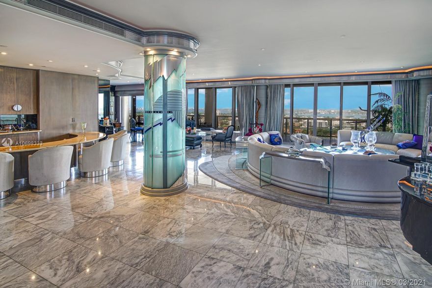 Private elevator leads you to one of the most unique Penthouses in Bal Harbour. Stretching over 5,883 living sq ft  & 7,310 total sq ft/ per appraiser, this sky residence is larger than other penthouses & features endless Biscayne Bay, Ocean & city skyline views.  Expansive wraparound terraces invite you to marvel at magnetic sunrises & sunsets. Grand foyer opens into a one of a kind spectacular living room w/ the bar & dining room created for entertaining large parties. It is followed by 2 guest bedrooms, 1 bedroom staff quarter, 5.5 baths, & a Royal size master suite w/ sitting area, his & her's baths & closets. Her closet galore features built- ins which will satisfy every fashionista. Bal Harbour Tower is a full service building w/ resort style amenities & renowned private restaurant.