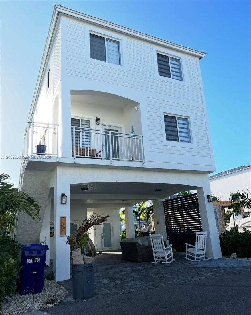 Welcome to residence #100 in the prestigious Key Largo Ocean Resort on MM 95 of the Florida Keys — a beautifully designed luxury home offering the finest in modern coastal living. This concrete block, full impact glass home is built to last with elegance and function at the forefront. 4 bedrooms with plenty of closet space, 3 full bathrooms, a spacious kitchen, dining room and family room. The property boasts a ground floor storage with additional stainless-steel refrigerator and a private elevator. Plenty of room to park your boat in the double covered driveway and still have space for entertaining with outdoor furniture and outdoor TV. Key Largo Ocean Resort has a very low HOA fee to include the following: Private boat ramp, fish stations & 40’ boat slip rentals (~$300/month), direct ocean access with NO bridges, resort-style clubhouse & pool, courts for basketball, tennis, pickleball, children’s playground, regular community events like Full Moon Parties & Golf Cart Parades. 24-hour manned guard gate and security patrol. This property and community have it all and it is priced to sell now. Easy to show, please see broker remarks for more information.