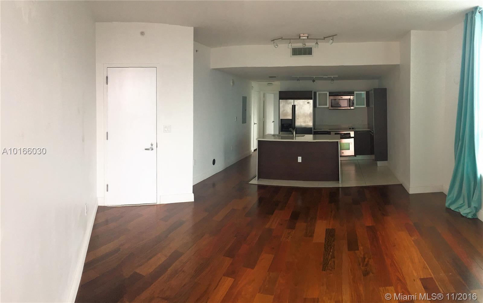 Luxurious condominium. European style kitchen. Hardwood Floor Throughout, Stainless steel appliances, Amazing view of Biscayne Bay and the City.